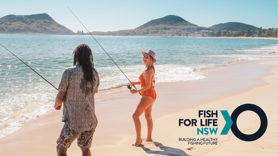 People fishing on a beach