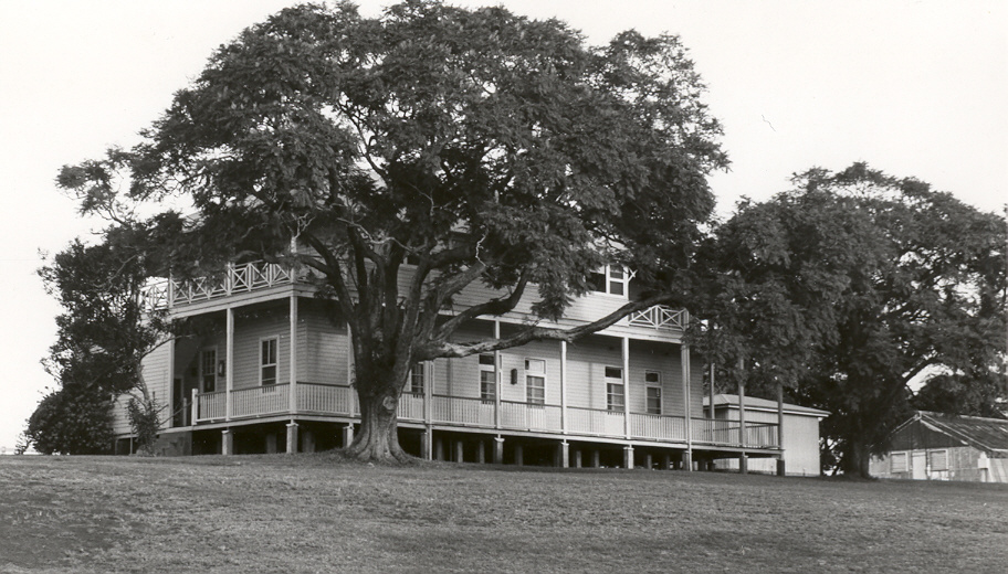 An undated black and white photo of a residence building