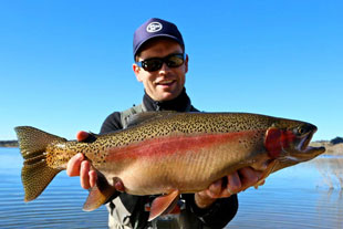 Man with fish caught at Thompson Creek Dam