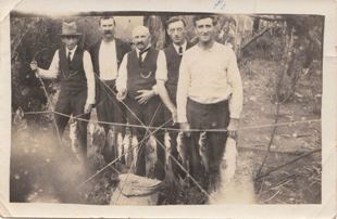 Tramworkers with their catch