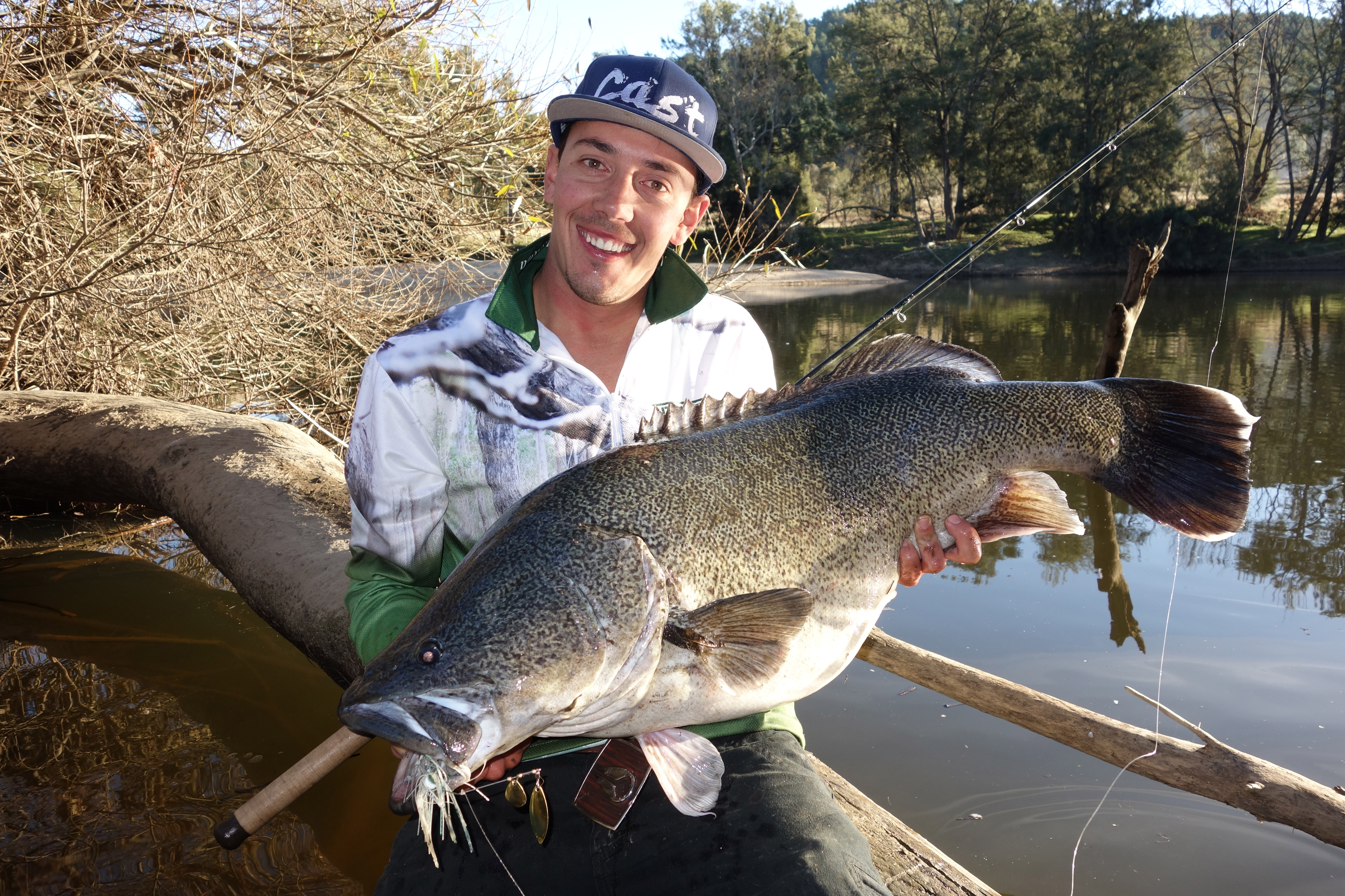 An angler on the Murrumbidgee River with a 105cm Murray Cod - Photo credit Chris Cleaver