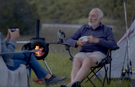 People camping by a fire