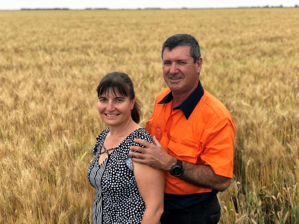 Julie and Glen are standing in their paddock