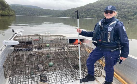 Fisheries officer with illegal traps seized from the Sydney area