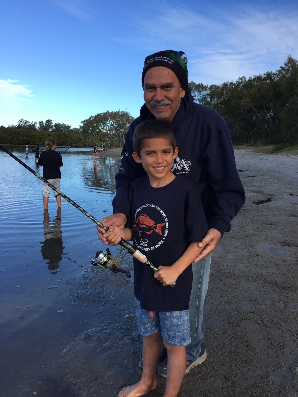 Aboriginal man and boy fishing