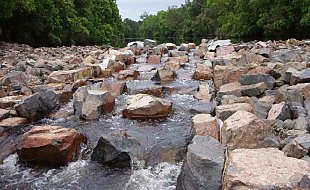 River rushes through rock pathways allowing fish to progress