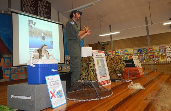 Fisheries Officer in a room speaking at an information session (NSW North Coast)