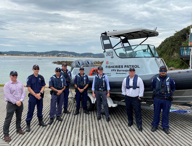 Minister for Agriculture Adam Marshall (middle) pictured with Member for Terrigal Adam Crouch MP and Fisheries Officers at Terrigal boat ramp.