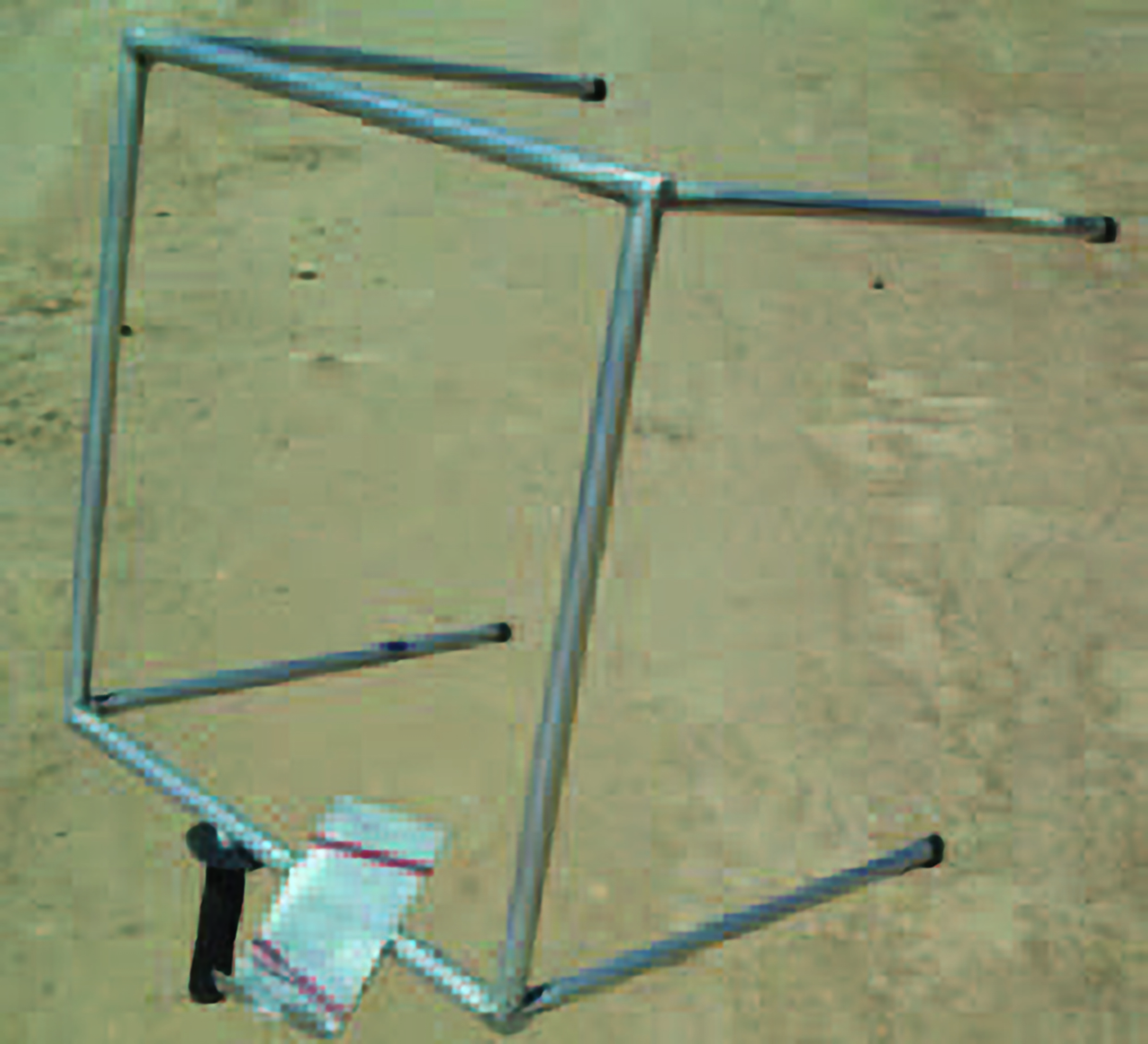 Figure 1. A 0.125 m³ square counting frame with a notepad holder.