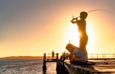 Kids fishing on jetty