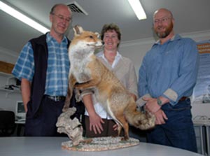Left to right - NSW Department of Primary Industries' Glen Saunders and Lynette McLeod discuss the important role shooters play in the European fox survey project with Sporting Shooters Association of Australia representitive Boyd Mackinlay.