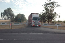 Farewell Trangie ... the truck pulls on to the Mitchell Highway from Trangie Agricultural Research Centre.